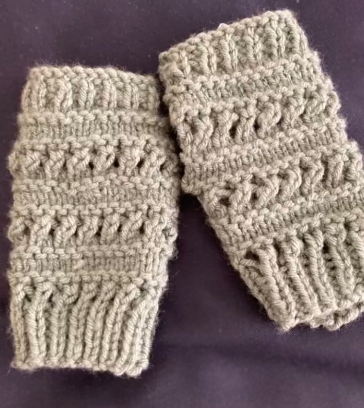 A pair of knit fingerless gloves.
